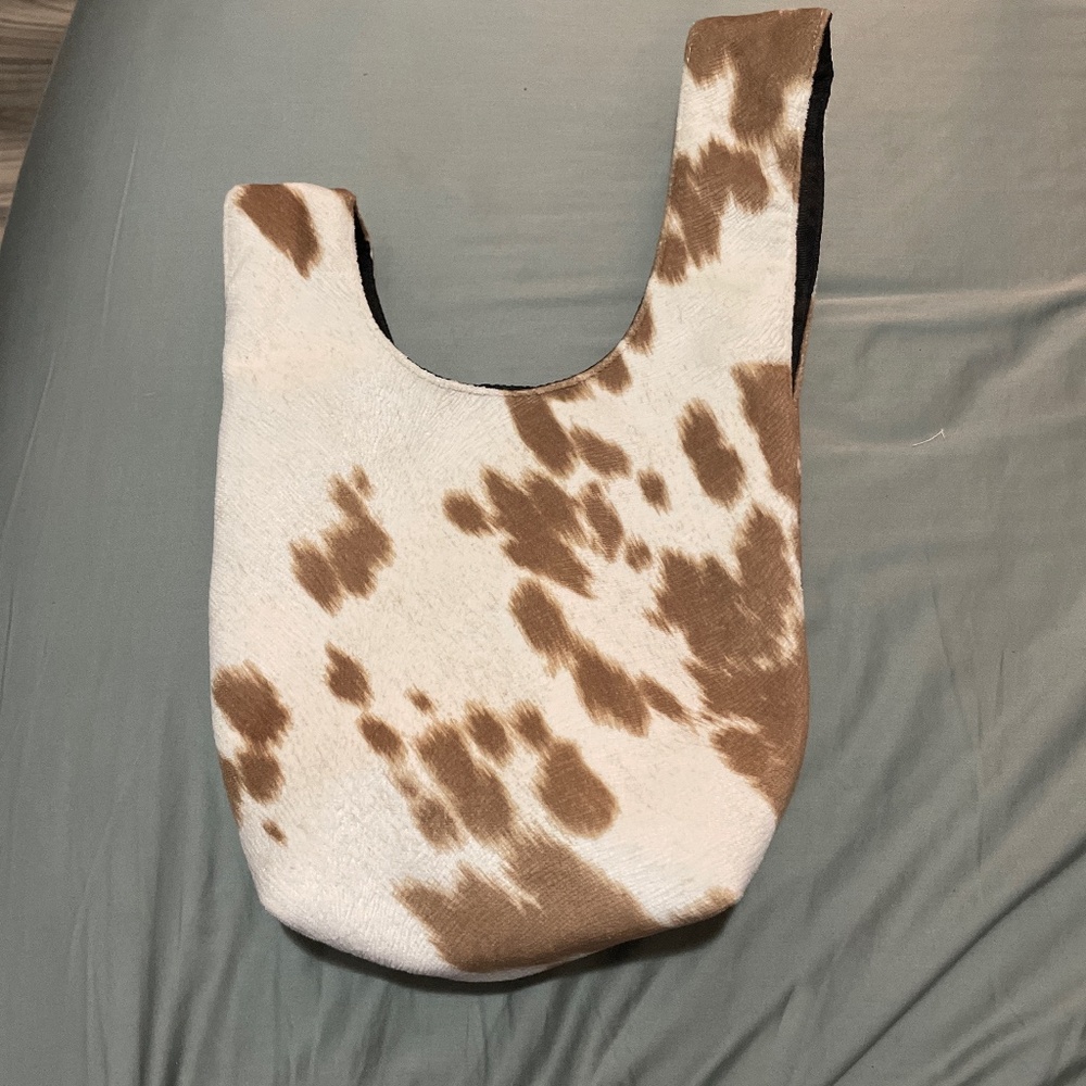 Yaito cow print knot bag